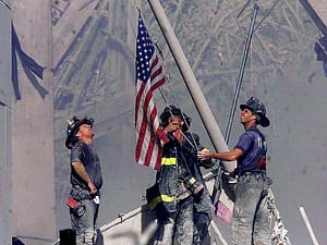 Firefighters-flag-remembering-September-11-2001